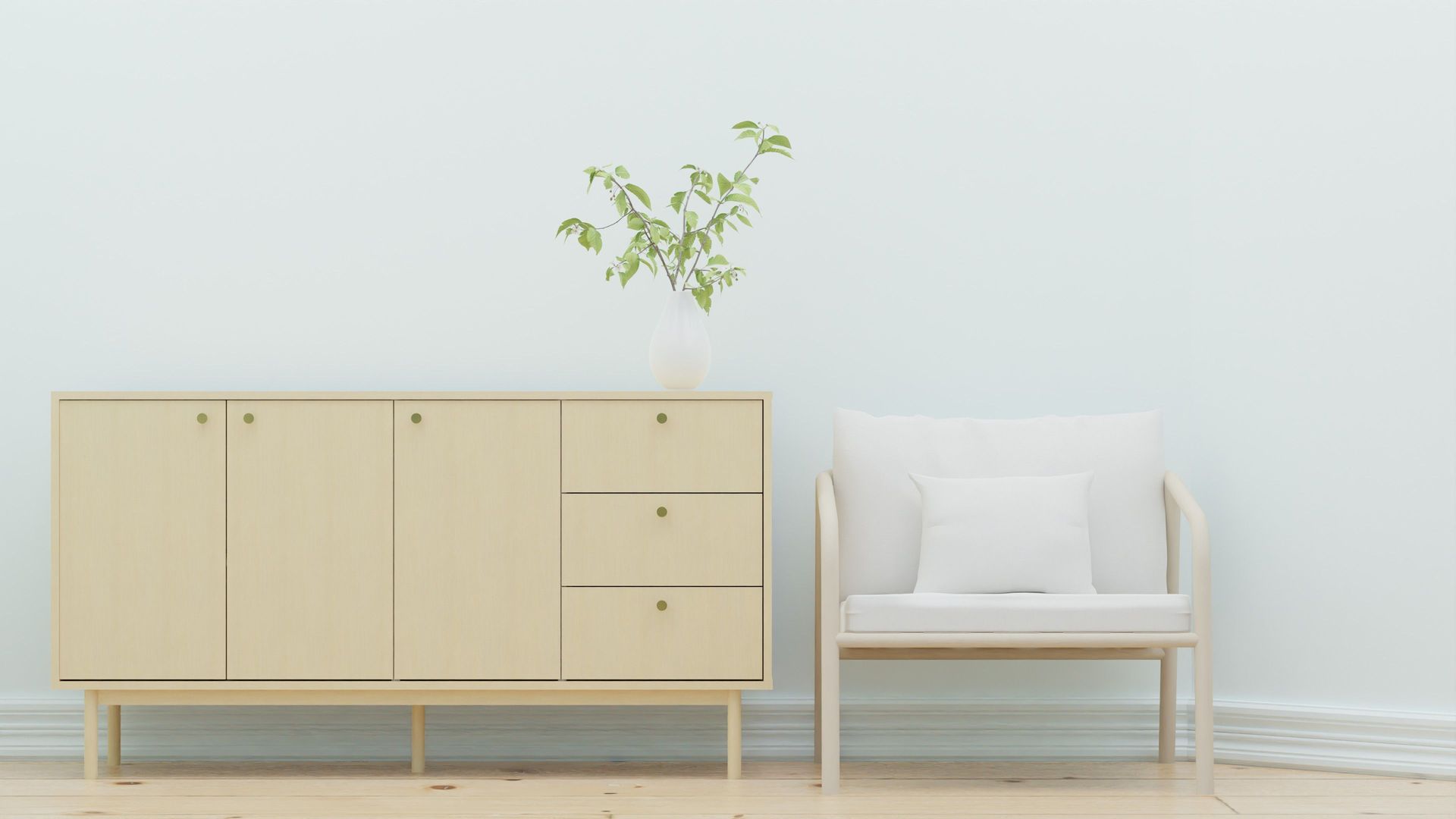 Elegant minimalist interior design featuring a wooden sideboard and armchair with greenery.